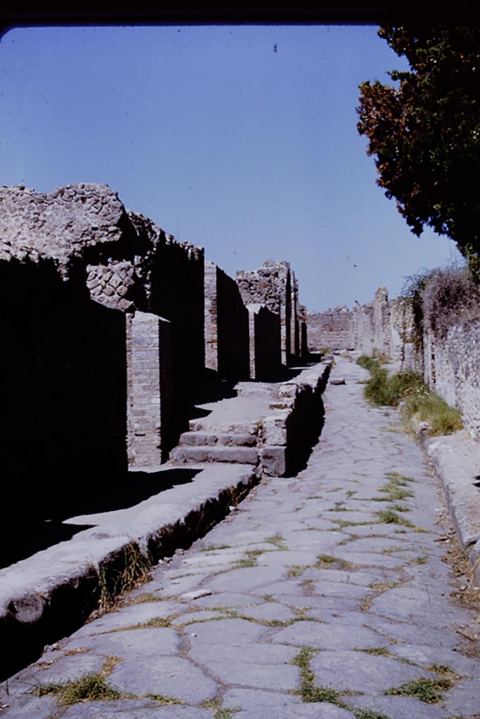 Vicolo della Regina, Pompeii, between VIII.2 and VIII.6. 1968.
Looking west from VIII.2.38. Photo by Stanley A. Jashemski.
Source: The Wilhelmina and Stanley A. Jashemski archive in the University of Maryland Library, Special Collections (See collection page) and made available under the Creative Commons Attribution-Non-Commercial License v.4. See Licence and use details.
J68f1059