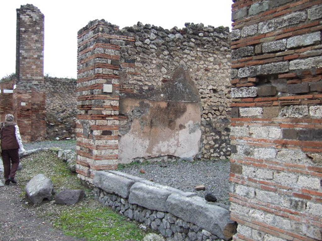Vicolo di Eumachia at VII.10.6. East side. Looking north to junction with Vicolo del Balcone Pensile. December 2005.