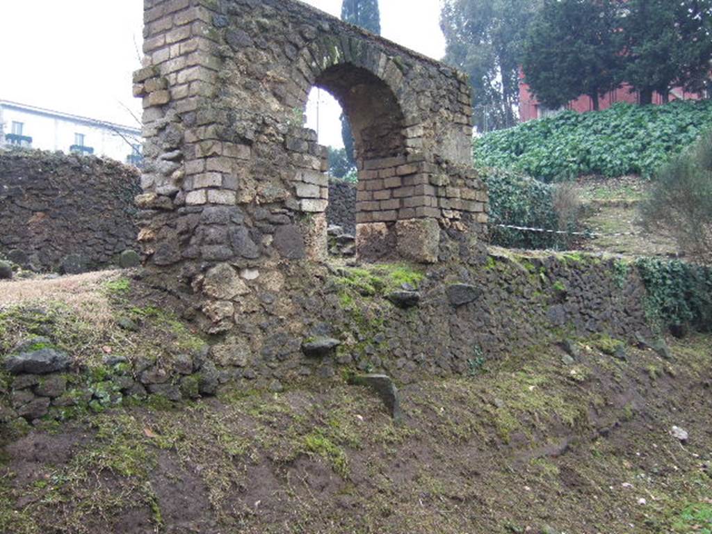 FPSD Pompeii. December 2005. Looking south-west past FPSE to remains of lava block steps.
The tomb area was accessible from the front by a short set of lava block steps of which only one remained.