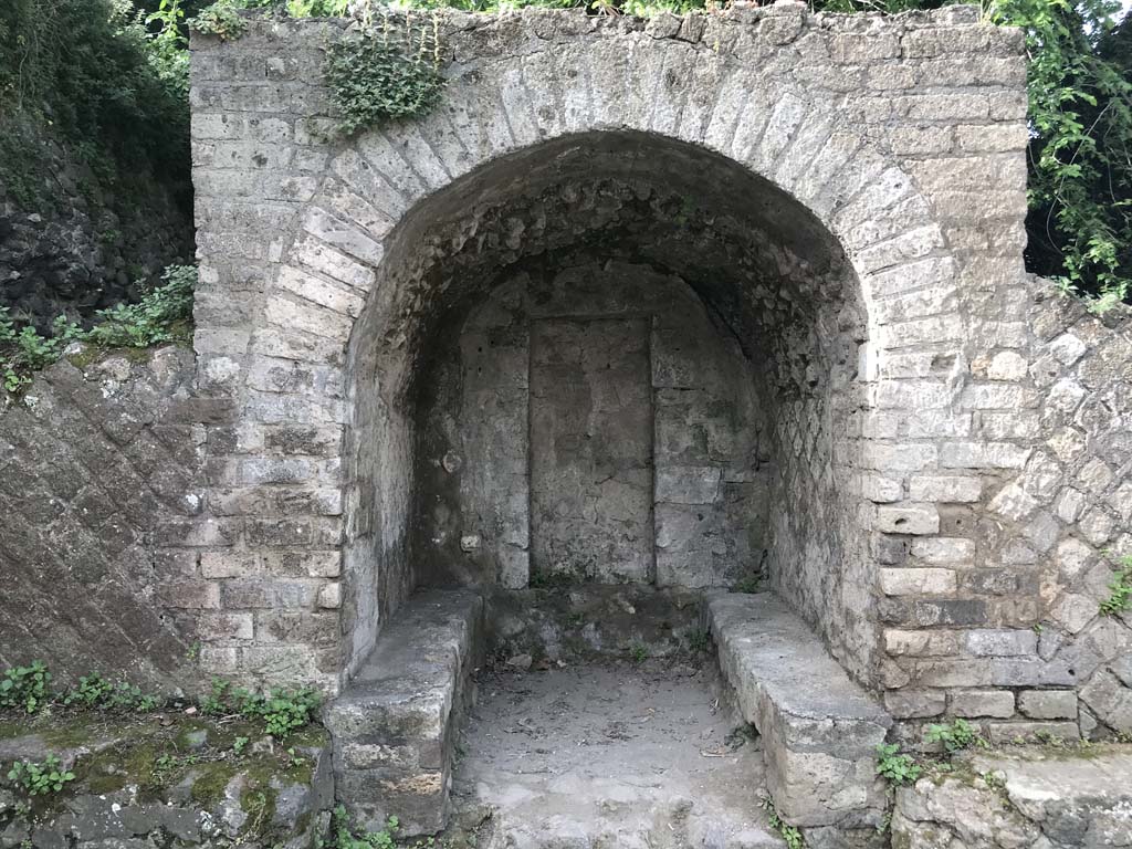 HGW01 Pompeii. April 2019. Looking west towards benches around the arched tomb of Marcus Cerrinius Restitutus.
Photo courtesy of Buzz Ferebee.