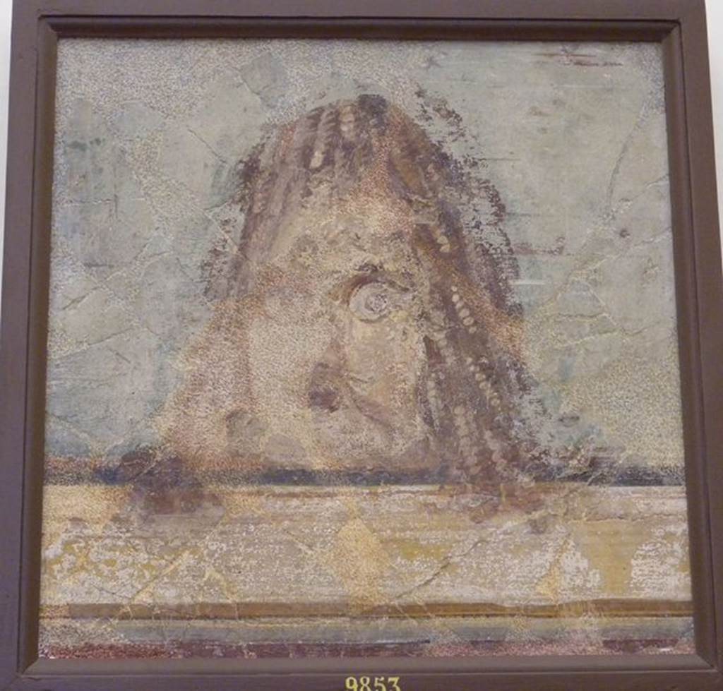 HGW04 Pompeii. Schola Tomb of Mamia, wall painting of mask. Found 2nd July 1763 on the north wall of the enclosure separating HGW04 from HGW04a. Now in Naples Archaeological Museum. Inventory number 9853. See Pagano, M. and Prisciandaro, R., 2006. Studio sulle provenienze degli oggetti rinvenuti negli scavi borbonici del regno di Napoli. Naples : Nicola Longobardi. (p. 44). According to Allroggen-Bedel, all of the above three paintings were found in the same room in VI.17.9-10.
See Allroggen-Bedel A, Die malereien aus dem Haus Insula Occidentalis 10, In Cronache Pompeiane, II, 1976 (p. 147-8).
