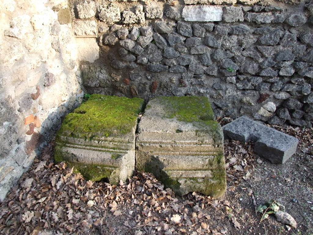HGW04a Pompeii. December 2006. Fragment of stonework near tomb.