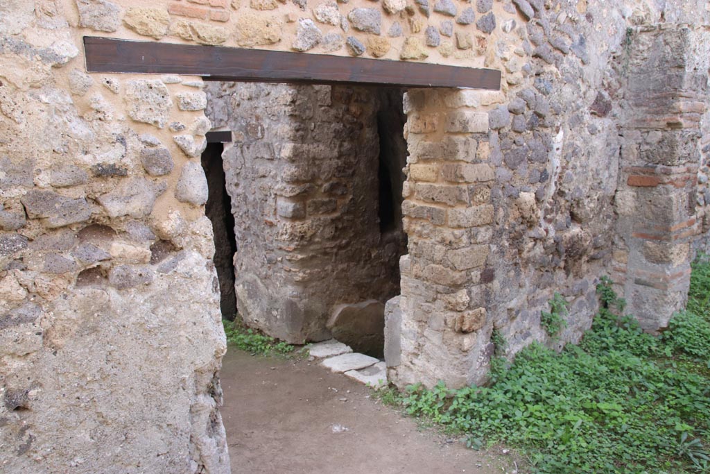 HGW25 Pompeii. Part of Villa of Diomedes. October 2023.
Looking towards south wall with doorway leading into Villa. Photo courtesy of Klaus Heese.