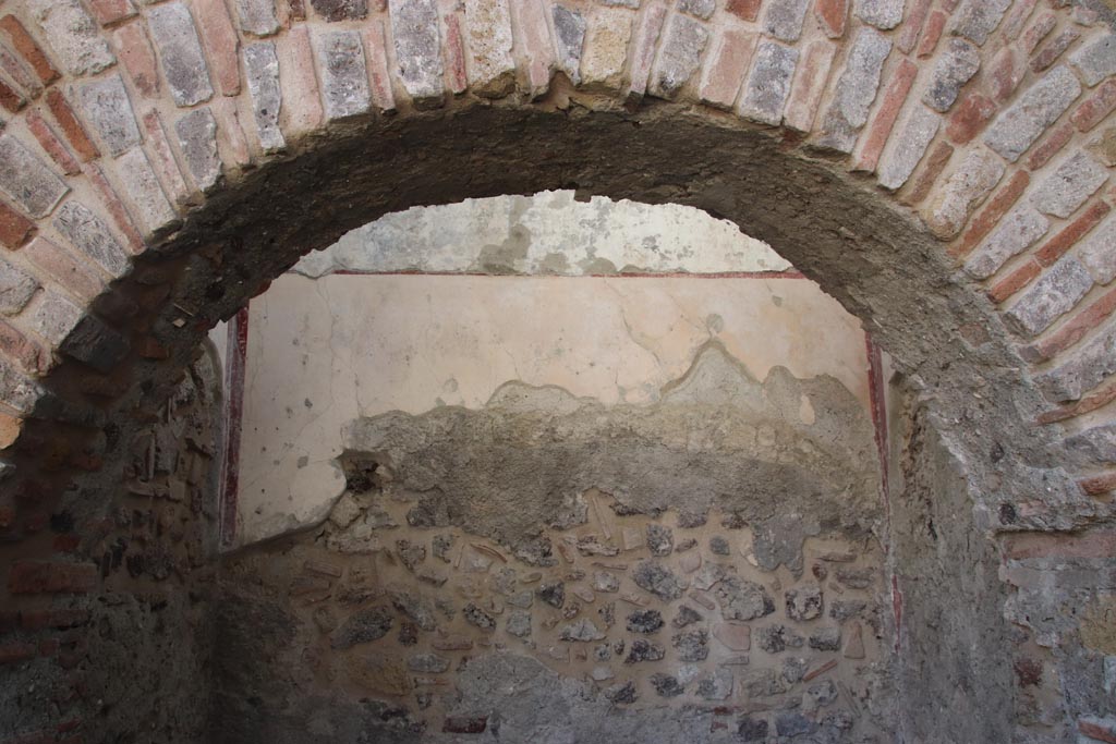 HGW25 Pompeii. Part of Villa of Diomedes. October 2023.
Room 7,8, detail of decoration on upper south wall. Photo courtesy of Klaus Heese.