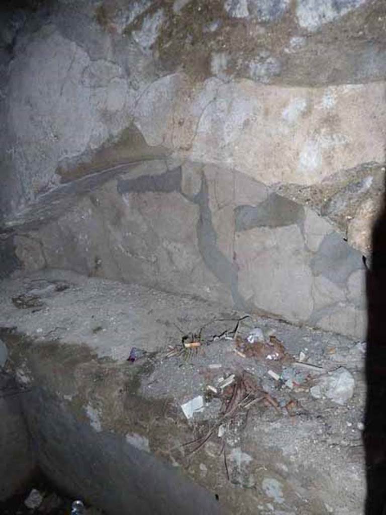Pompeii Porta Nocera. May 2010. Tomb 7OS. Room on west side of entrance corridor. Niche on north wall.
In the room on the west side in the tomb arch on the north wall was found a broken cinerary urn inscribed in charcoal FLAVIO / PHILOXENI (sic!).
See D’Ambrosio, A. and De Caro, S., 1983. Un Impegno per Pompei: Fotopiano e documentazione della Necropoli di Porta Nocera. Milano: Touring Club Italiano. (7OS)