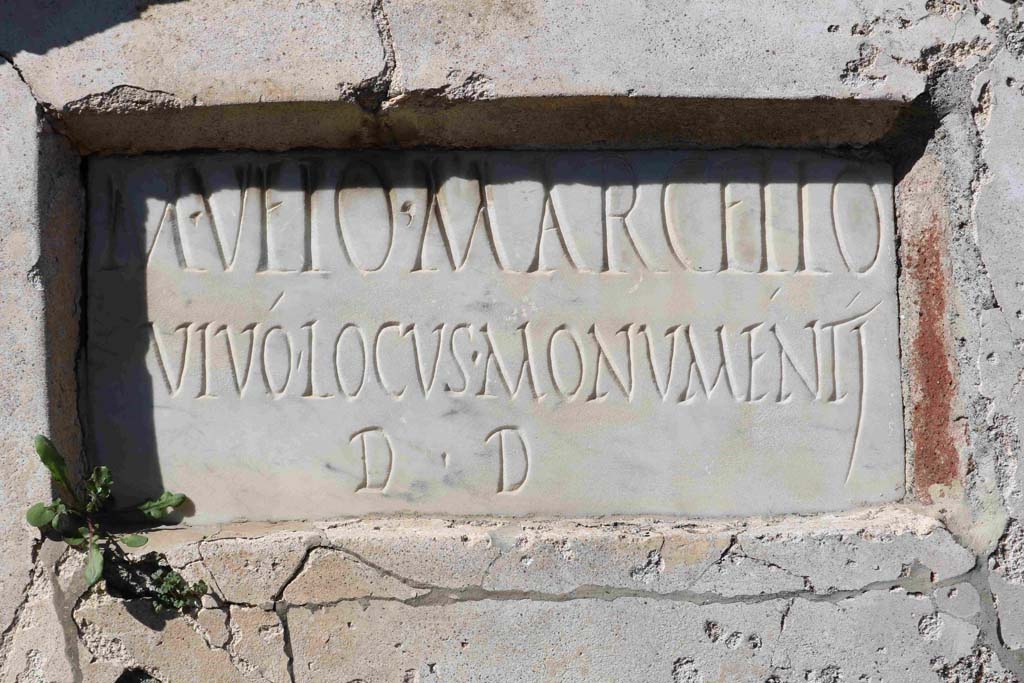 Pompeii VGI. February 2020. Marble plaque with Latin inscription. Photo courtesy of Aude Durand.
It reads -
M(arco) VEIO MARCELLO
VIVO LOCVS MONVMENTI
D(ecreto) D(ecurionum).
The tomb was still incomplete at the time of the eruption in 79 AD.
See La Rocca, de Vos, de Vos, 1981. Guida Archeologica di Pompei; II Edizione. Milano: Arnoldo Mondadori Editore. (p. 280).