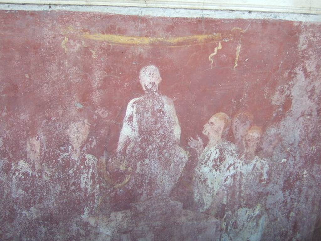 VGJ Pompeii. May 2006. Inner tomb east wall. Painting of seated aedile. Engelmann describes this as “the young dignitary (aedilis) in his character of justiciary sitting on a podium; around him several men, of which the one at his right devoutly looks up at him and lifts his right hand.” See Engelmann, W., 1929. New Guide to Pompeii: Second Edition. Engelmann. (p. 55).