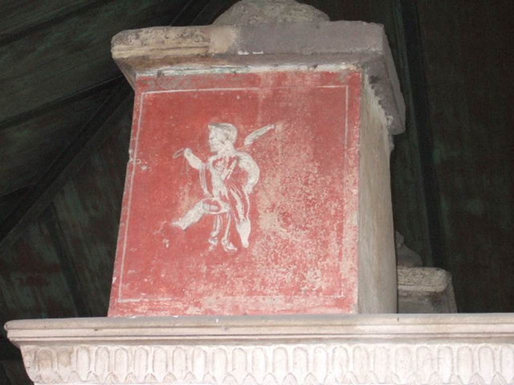 VGJ Pompeii. December 2005. Painting of cupid on east side of inner tomb.