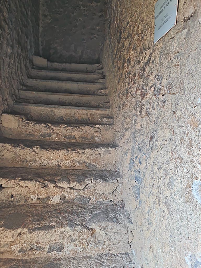 Tower XI, Pompeii. November 2023.
Looking west up steps from entrance doorway towards middle floor. Photo courtesy of Giuseppe Ciaramella.