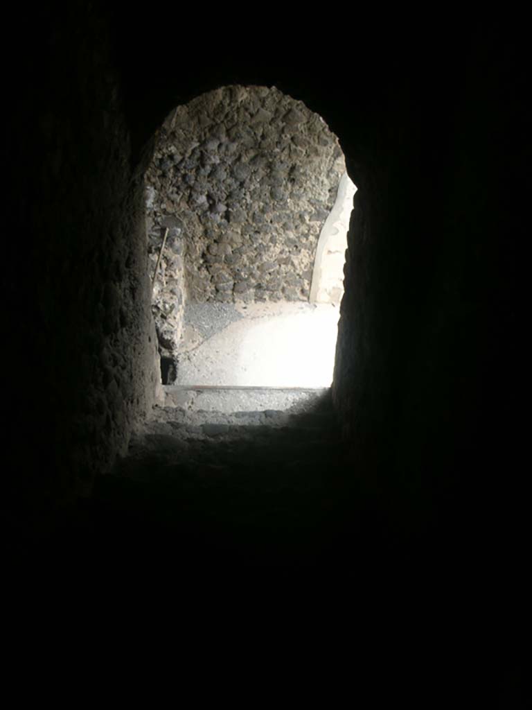 Tower XI, Pompeii. May 2010.
Looking down steps from middle floor towards entrance doorway. Photo courtesy of Ivo van der Graaff.