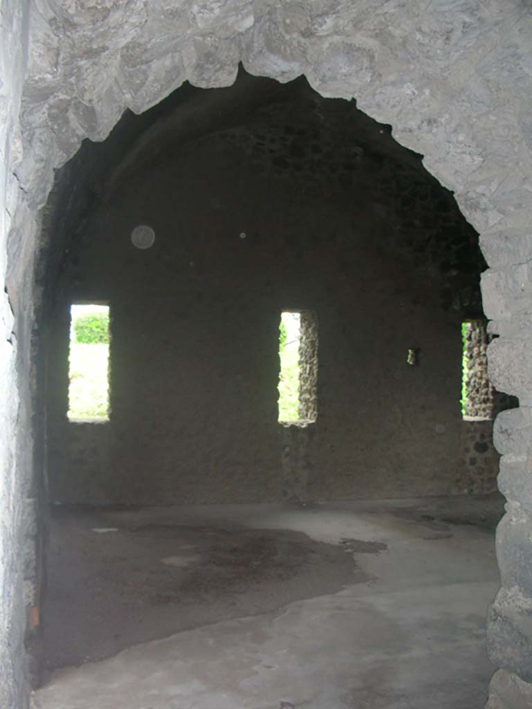Tower XI, Pompeii. May 2010.
Looking through arched doorway towards north wall of middle floor. Photo courtesy of Ivo van der Graaff.