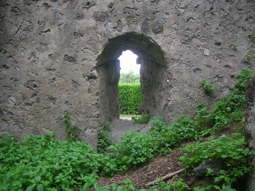 Tower VII, Pompeii. May 2010. 
Looking north through arrow slit window at south end of north wall of main chamber. Photo courtesy of Ivo van der Graaff.

