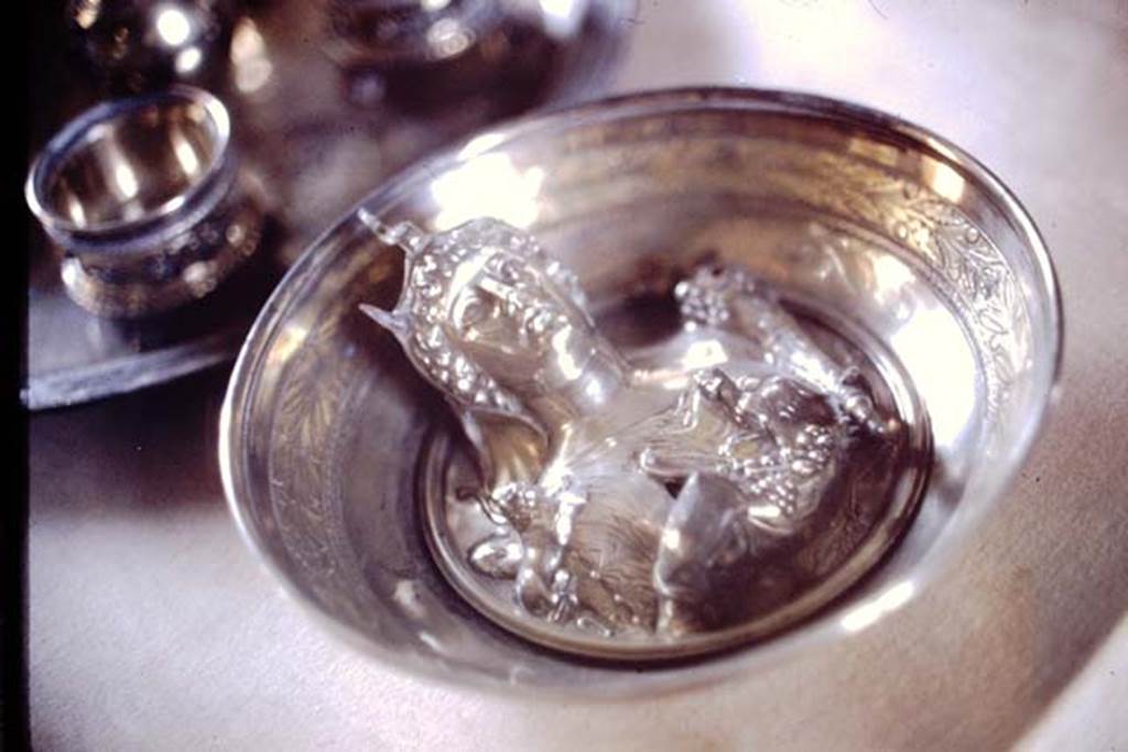 Villa della Pisanella, Boscoreale. 1974. Silver and gold plate with female figure with elephants trunk on head and holding a cornucopia.
Now in the Louvre. Inventory number BJ1969 or BJ1865. Part of silver treasure. Photo by Stanley A. Jashemski.
Source: The Wilhelmina and Stanley A. Jashemski archive in the University of Maryland Library, Special Collections (See collection page) and made available under the Creative Commons Attribution-Non-Commercial License v.4. See Licence and use details.
J74f0828