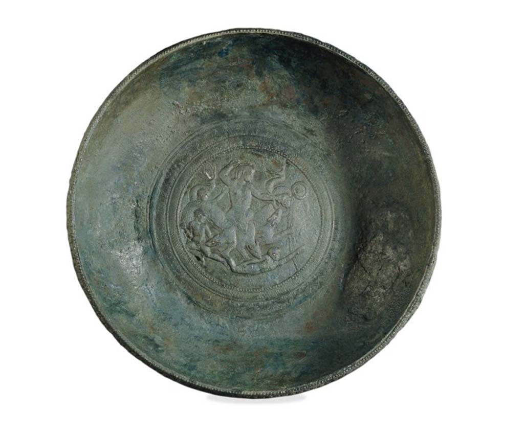 Villa della Pisanella, Boscoreale. bronze handled dish (patera) showing Scylla attacking the companions of Ulysses. The handle is ancient, but not made for this dish.
Photo © Trustees of the British Museum. Inventory number BM 1897,0726.7. Use subject to CC BY-NC-SA 4.0.