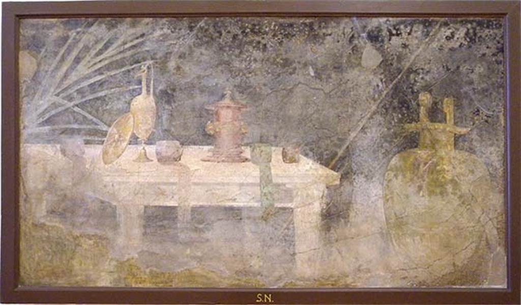 Villa of P Fannius Synistor at Boscoreale. Peristyle E, south wall, west end. Wall painting of marble table with athletic prizes. Now in Naples Archaeological Museum. Inventory number s.n.6.