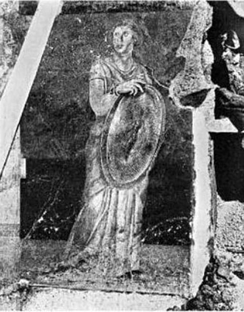 Villa of P Fannius Synistor at Boscoreale 1900. Room H south end of east wall. In situ excavation photo of standing woman holding a gold shield.