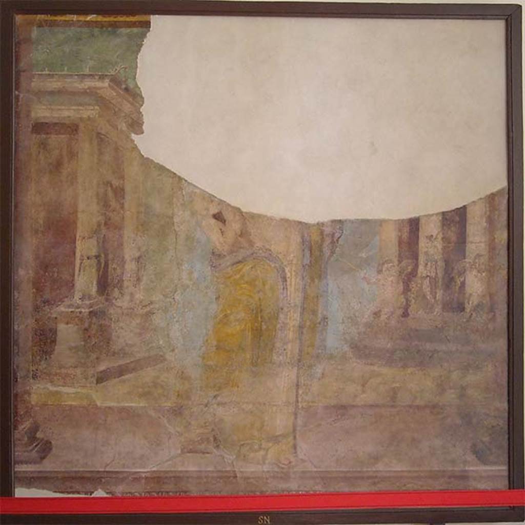 Villa of P Fannius Synistor at Boscoreale. Room H, north wall, centre panel. Painting of Venus Genetrix and cupids. Venus is covered only in a yellowish mantle lined with violet. Cupid rests on her right leg. The blue sea is behind, and a small temple with the winged Psyche. At the foot of the temple are other fishing cupids with outstretched wings. On the other side of the painting in the middle of the sea is another temple, with Fortuna on a base.
Another god stands on another base. Now in Naples Archaeological Museum. Inventory number s. n. 4. See Barnabei F., 1901. La villa pompeiana di P. Fannio Sinistore. Roma: Accademia dei Lincei. p.53, Fig. 11.