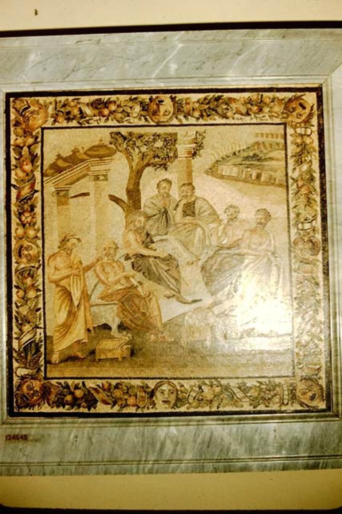 Villa of T. Siminius Stephanus, fondo Masucci-D'Aquino. 1957. 
Mosaic of the Academy of Plato (Dell’accademia Platonica).
Now in Naples Archaeological Museum. Inventory number 124545.
Photo by Stanley A. Jashemski.
Source: The Wilhelmina and Stanley A. Jashemski archive in the University of Maryland Library, Special Collections (See collection page) and made available under the Creative Commons Attribution-Non-Commercial License v.4. See Licence and use details.
J57f0538
