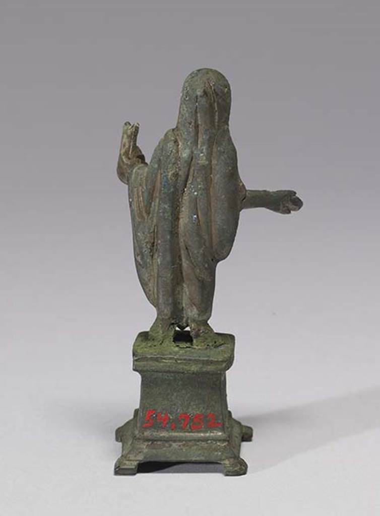 Boscoreale, Villa rustica in fondo D’Acunzo. Room 12, lararium.
Bronze statuette of sacrificing priest or genius familiaris, rear view.
Photo courtesy of The Walters Art Museum, Baltimore. Inventory number 54.752.
http://thewalters.org/
Creative Commons Attribution-ShareAlike 3.0 Unported Licence