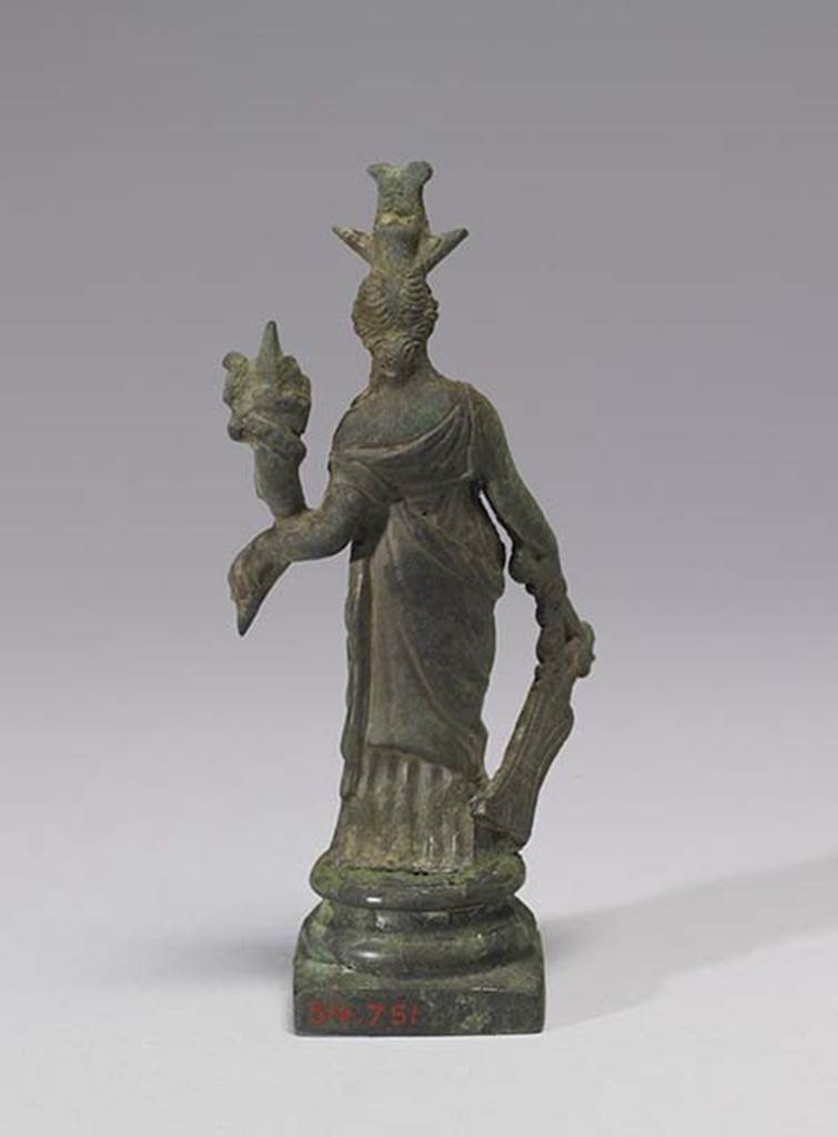 Boscoreale, Villa rustica in fondo D’Acunzo. Room 12, lararium.
Larger bronze statuette of Isis-Fortuna, rear view.
Photo courtesy of The Walters Art Museum, Baltimore. Inventory number 54.751.
http://thewalters.org/
Creative Commons Attribution-ShareAlike 3.0 Unported Licence