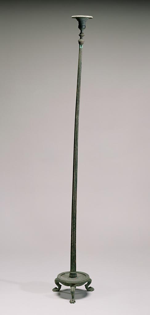 Villa in Boscoreale. Bronze candelabrum with silver inlays.
Digital image courtesy of the Getty's Open Content Program. Now in the Getty Museum, inventory number 72.AC.132.
One of a pair of identical bronze candelabra (lampstands) that once belonged to the household furnishings of a Roman villa (see also 72.AC.131).