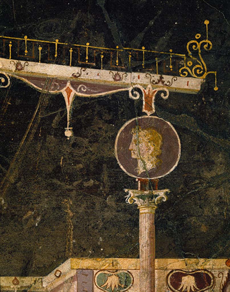 Villa of Agrippa Postumus Boscotrecase. Black room. Detail from east end of aedicula on north wall.
This portrait medallion also has a purple background which was reserved for imperial subjects in this period.
© Metropolitan Museum New York. Rogers Fund, 1920. Inventory number 20.192.1.
See Anderson, M. L., 1988. The Imperial Villa at Boscotrecase in Metropolitan Museum Bulletin, 1988, p. 54 no 57.