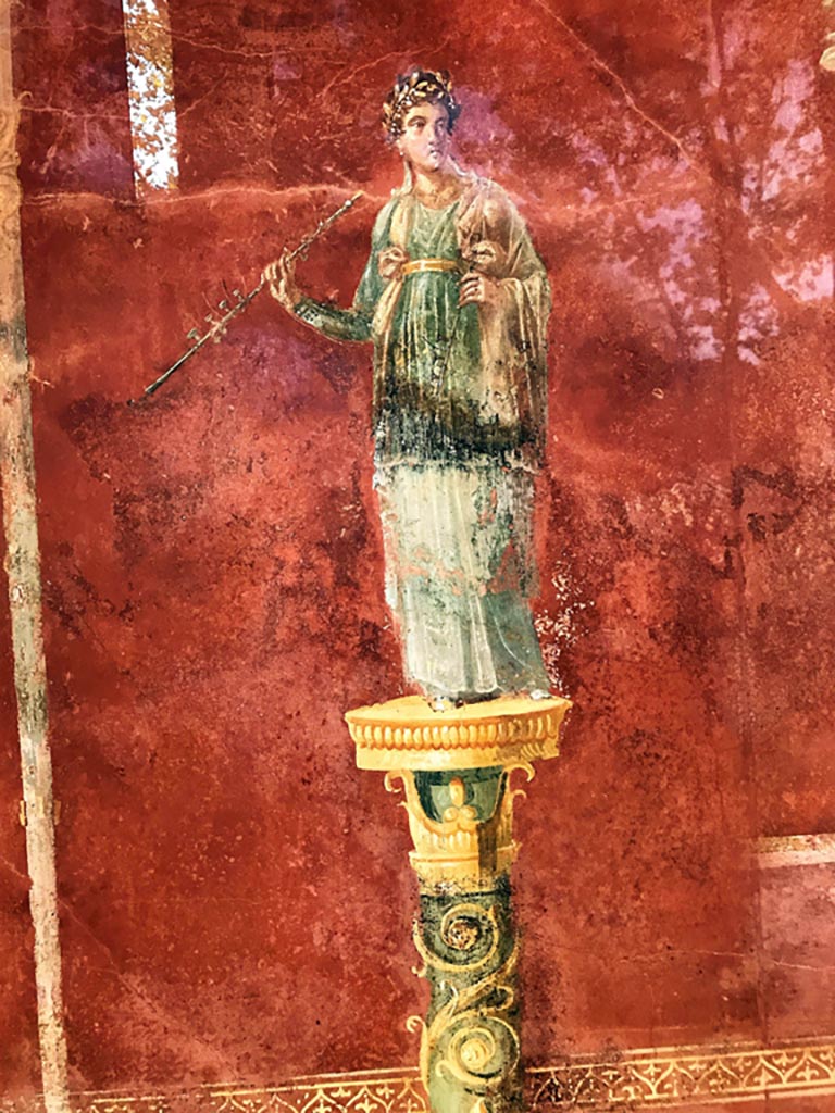 Complesso dei triclini in località Moregine a Pompei. December 2019.
Triclinium A, north wall. Euterpe the muse of flutes and music with a double flute.
Photo courtesy of Giuseppe Ciaramella.