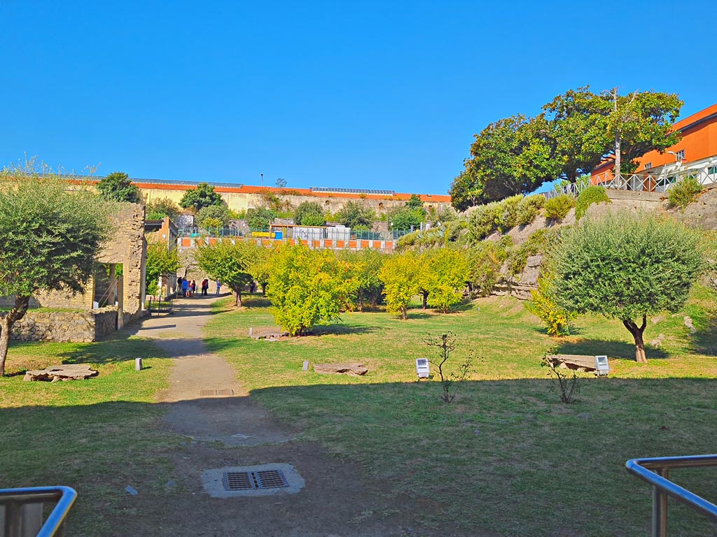 Oplontis Villa of Poppea, October 2023.
Looking west along pathway in north garden, across the front of the villa. Photo courtesy of Giuseppe Ciaramella.