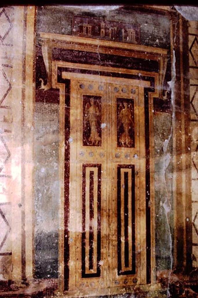 Oplontis, 1973. Room 5, painted doorway in the southern atrium. Photo by Stanley A. Jashemski.
Source: The Wilhelmina and Stanley A. Jashemski archive in the University of Maryland Library, Special Collections (See collection page) and made available under the Creative Commons Attribution-Non Commercial License v.4. See Licence and use details. J73f0370
