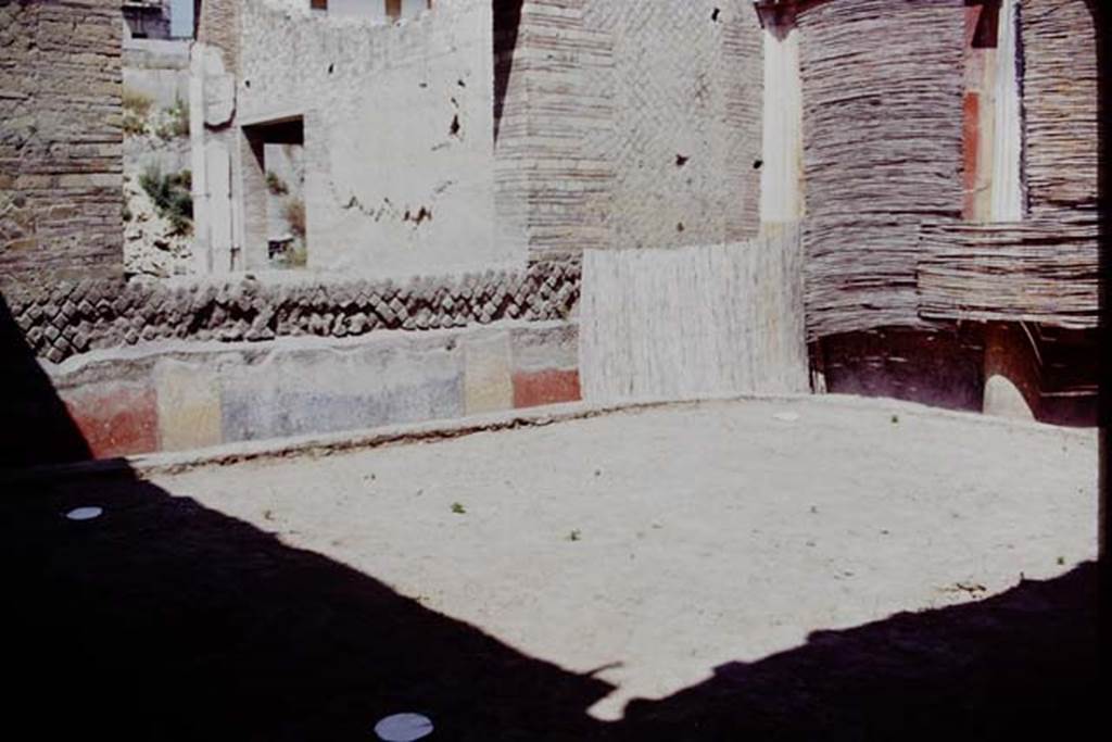 Oplontis, 1975. Area 20, the enclosed garden, looking towards the north-east corner.
The white painted circles are the locations of the root cavities. According to Wilhelmina, “In the north-west, north-east and south-west corners a root cavity was found. There was not one found in the south-east corner as this would have blocked the entrance to the garden.” Photo by Stanley A. Jashemski.
Source: The Wilhelmina and Stanley A. Jashemski archive in the University of Maryland Library, Special Collections (See collection page) and made available under the Creative Commons Attribution-Non Commercial License v.4. See Licence and use details. J75f0524