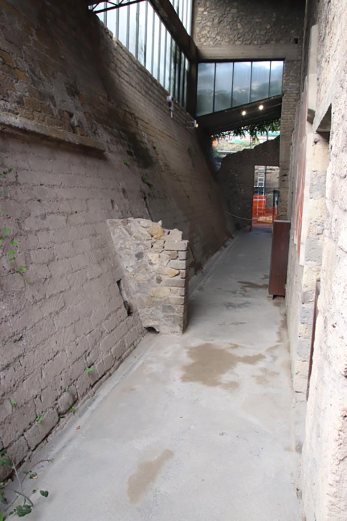 Villa of Poppaea, Oplontis, October 2023.
Corridor on east side of south side of atrium, looking west from doorway to room 23, on right.
Photo courtesy of Klaus Heese.