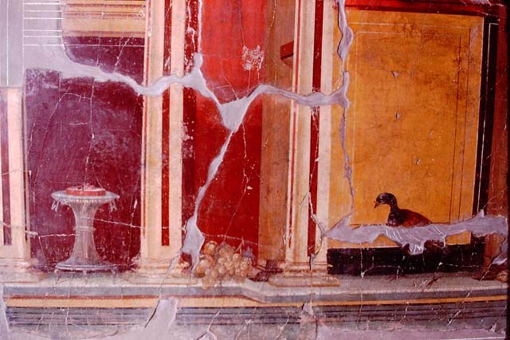 Oplontis, 1974. Room 23, detail from side wall showing a painted table with a column-like foot, a bunch of grapes and a bird. Photo by Stanley A. Jashemski.
Source: The Wilhelmina and Stanley A. Jashemski archive in the University of Maryland Library, Special Collections (See collection page) and made available under the Creative Commons Attribution-Non Commercial License v.4. See Licence and use details. J74f0655