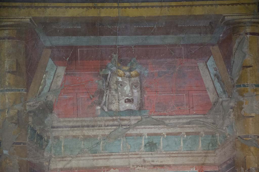 Oplontis Villa of Poppea, March 2019. Room 23, painted mask in centre of west wall.
Foto Annette Haug, ERC Grant 681269 DÉCOR.