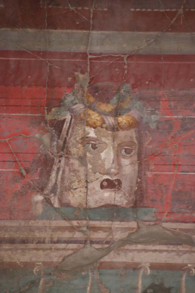 Oplontis Villa of Poppea, September 2021.
Room 23, detail from mask in centre of west wall. Photo courtesy of Klaus Heese.