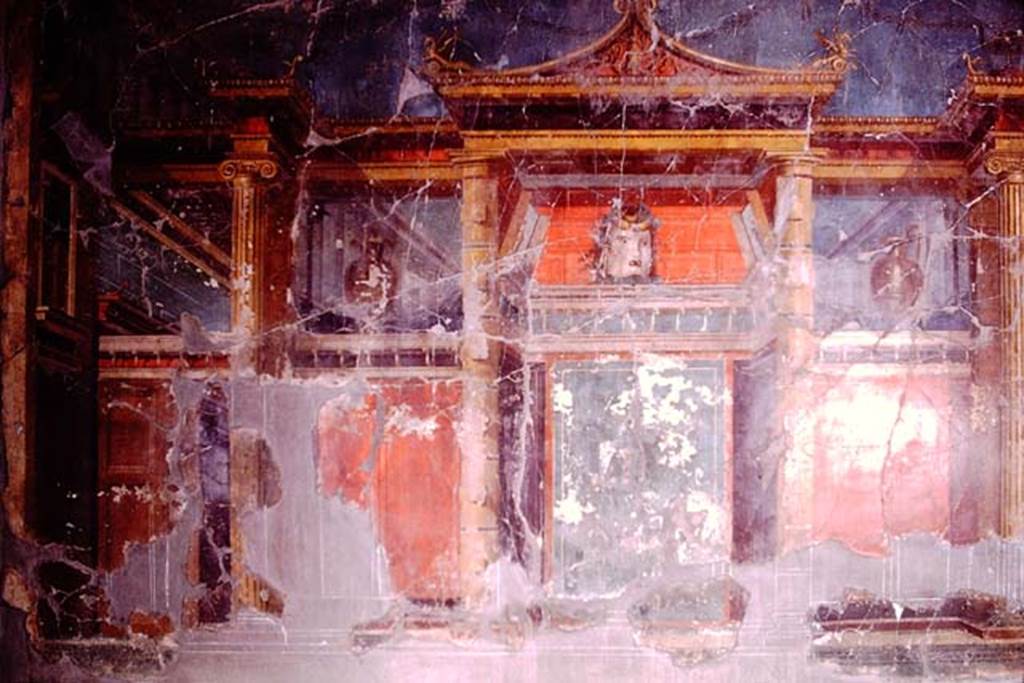 Oplontis, 1974. Room 23, west wall with painted tragic mask, in the centre. Photo by Stanley A. Jashemski.
Source: The Wilhelmina and Stanley A. Jashemski archive in the University of Maryland Library, Special Collections (See collection page) and made available under the Creative Commons Attribution-Non Commercial License v.4. See Licence and use details. J74f0652