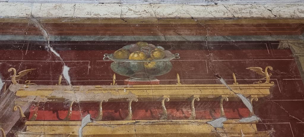 Oplontis Villa of Poppea, January 2023.
Room 23, upper north wall with still-life of a glass bowl full of pomegranates. Photo courtesy of Miriam Colomer.