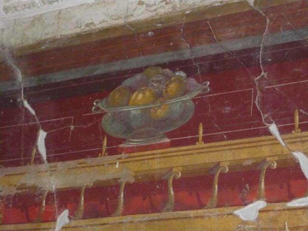 Oplontis, May 2010. Room 23, painted wall with still-life of glass bowl with pomegranates, from north wall. Photo courtesy of Buzz Ferebee.