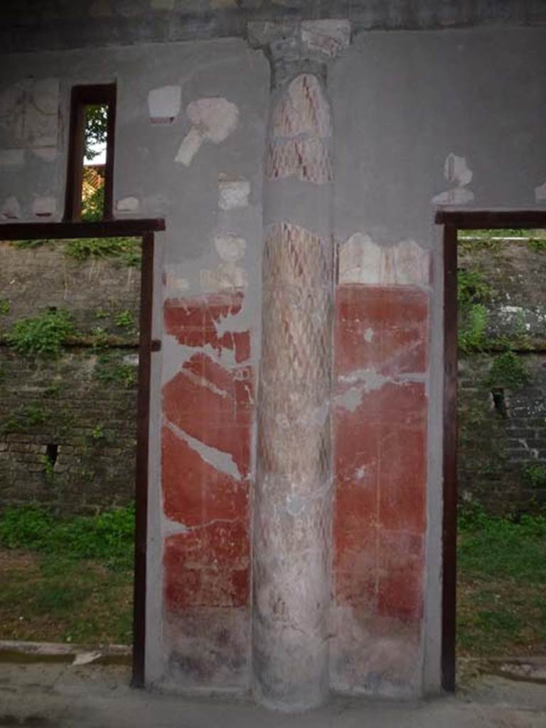 Oplontis, September 2011. Room 24, interior half-column embedded into the wall.
Photo courtesy of Michael Binns. Malandrino describes - “the southern portico with columns painted on the inside and fluted in stucco on the outside. The spaces between the columns were partially closed by masonry panels to protect both the porticoes themselves as well as the rooms that face onto them, from the summer heat and from the rain and the southerly winds.”
See Malandrino, C. (1978). Oplontis, (p. 72), where Room 24, is described as Room19 on the plan).