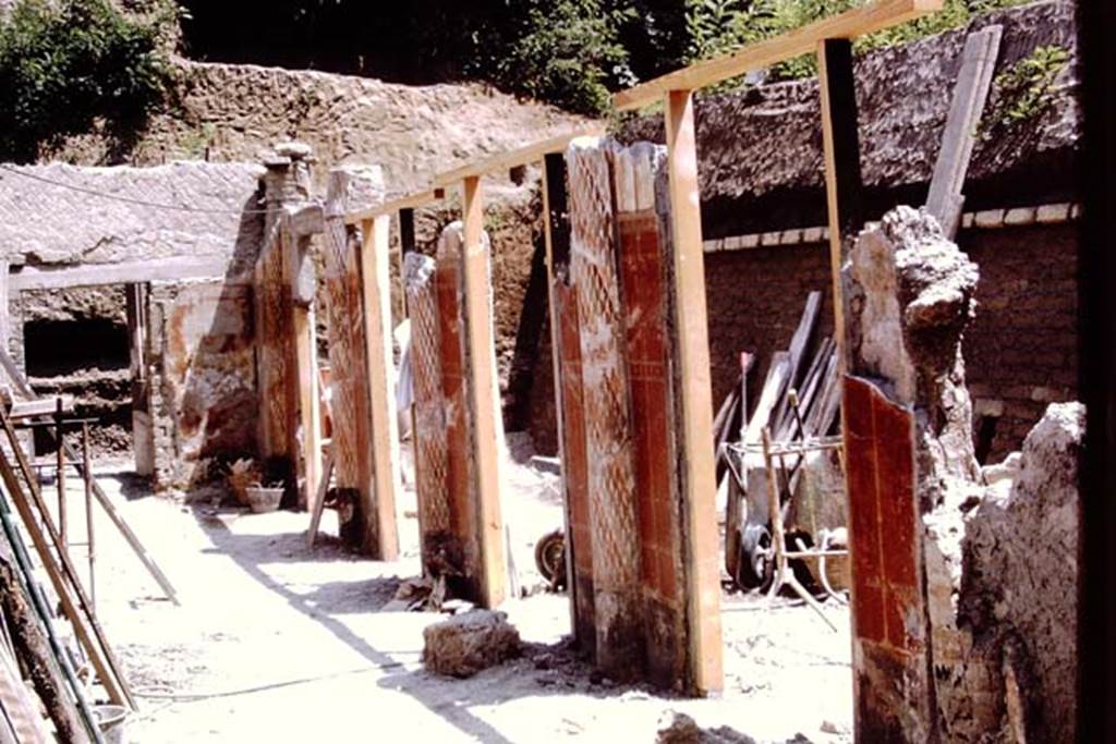 Oplontis, 1973. Looking east along portico 24 in the south-eastern part of the Villa.
The south-west part of Peristyle 59, with the wheel-barrows, can be seen through the “doorways” between the columns. Photo by Stanley A. Jashemski.
Source: The Wilhelmina and Stanley A. Jashemski archive in the University of Maryland Library, Special Collections (See collection page) and made available under the Creative Commons Attribution-Non Commercial License v.4. See Licence and use details. J73f0366