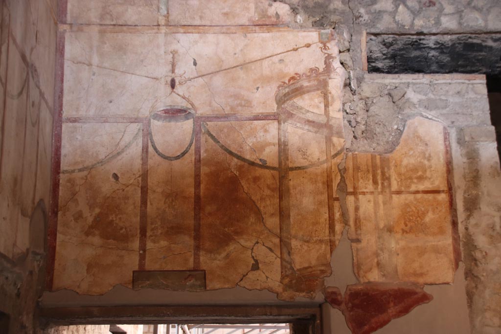 Oplontis Villa of Poppea, October 2022.
Room 27, detail of painted west wall above doorway to room 1. Photo courtesy of Klaus Heese.