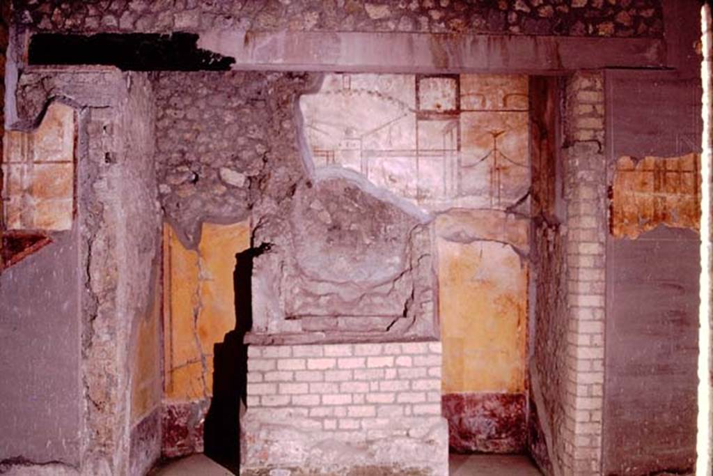 Oplontis, 1974. Room 27, looking towards west wall, and lararium with apse, in which was placed the masonry altar which held the symbols of the household gods. Photo by Stanley A. Jashemski.
Source: The Wilhelmina and Stanley A. Jashemski archive in the University of Maryland Library, Special Collections (See collection page) and made available under the Creative Commons Attribution-Non Commercial License v.4. See Licence and use details. J74f0664