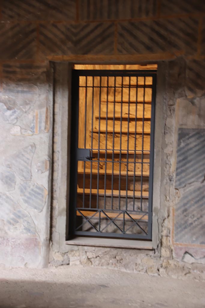 Oplontis Villa of Poppea, May 2024.
Room 32, doorway in east wall leading to room 42, steps to upper floor. Photo courtesy of Klaus Heese.