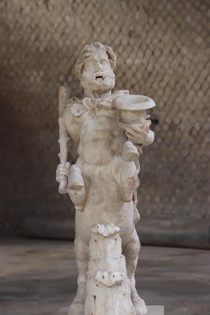 Villa of Poppaea, Oplontis, October 2023.
Statuette of Centaur holding a club and a crater, on display in Room 21. Photo courtesy of Klaus Heese.
