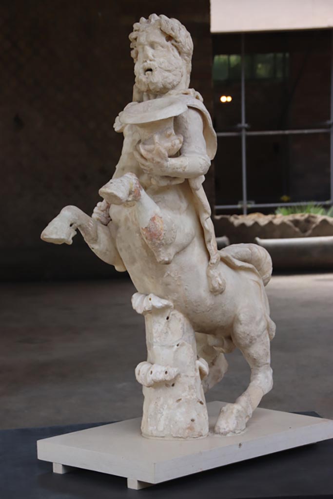 Villa of Poppaea, Oplontis, October 2023.
Statuette of Centaur holding a club and a crater, on display in Room 21. Photo courtesy of Klaus Heese.