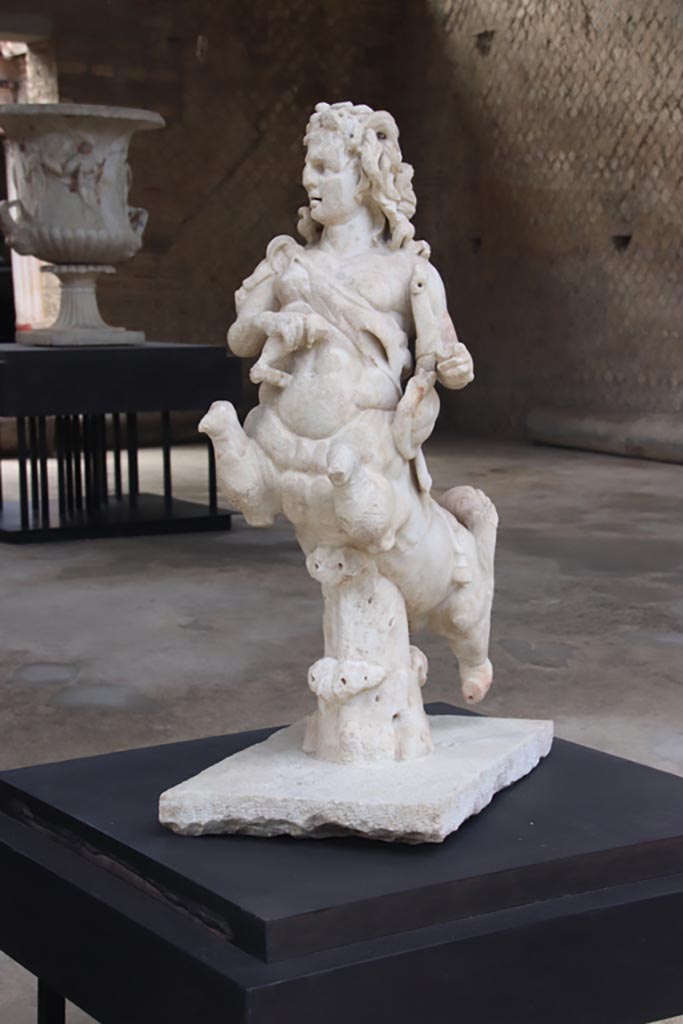 Villa of Poppaea, Oplontis, October 2023.
One of a group of four centaurs, a female holding a club and lyre, on display in Room 21.
Photo courtesy of Klaus Heese.