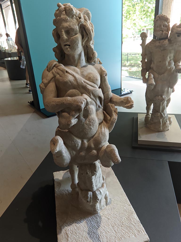 Oplontis Villa of Poppea, April 2022.
Statuette of a female holding a club and a lyre. Photo courtesy of Giuseppe Ciaramella.
