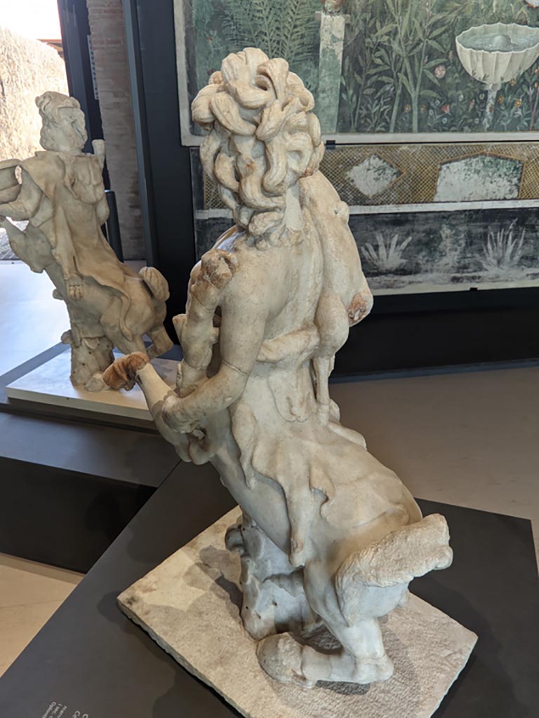 Oplontis Villa of Poppea, April 2022.
Rear of statuette of a female holding a fawn. Photo courtesy of Giuseppe Ciaramella.
