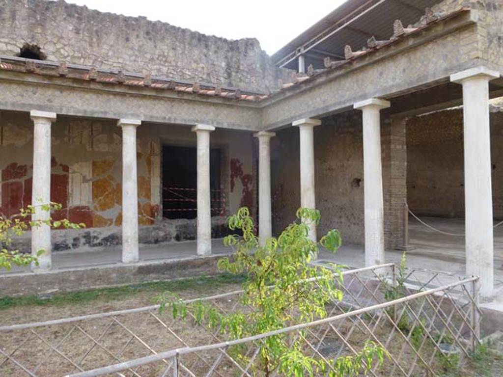 Oplontis, September 2011. Room 34, east portico of north garden, looking south-west towards doorway to room 30, and side doorway into room 21. Photo courtesy of Michael Binns.
