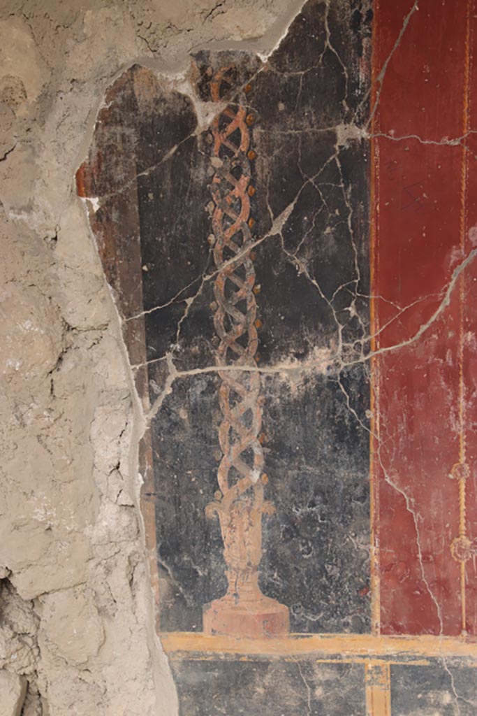 Oplontis Villa of Poppea, May 2024.
Portico 40, detail of painted decoration of twisted candelabra from west wall, in north-west corner.
Photo courtesy of Klaus Heese.