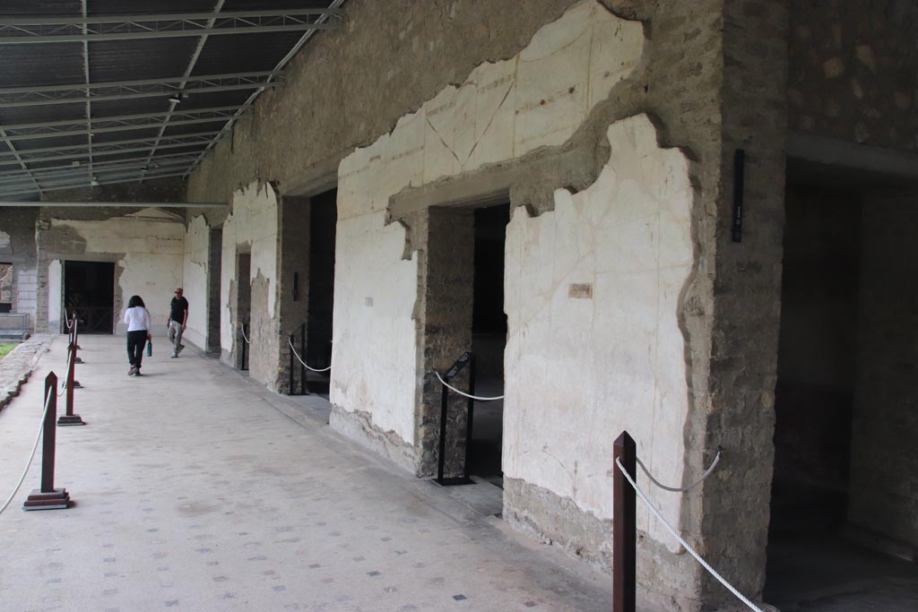 Villa of Poppaea, Oplontis, October 2023.
Area 60, looking south along west portico, with doorway to room 75, on right. Photo courtesy of Klaus Heese.